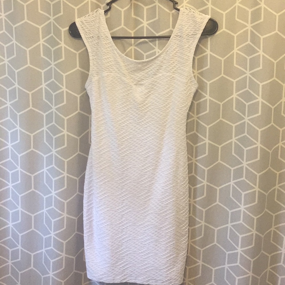 Mini skin tight white dress